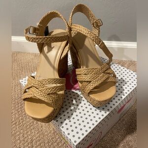 Woman’s corkscrew wedges, size 6.5